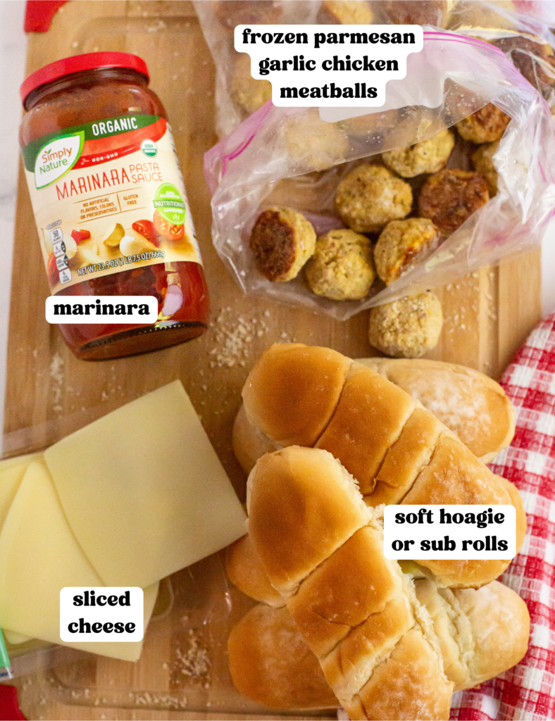 ingredients for meatball subs on cutting board