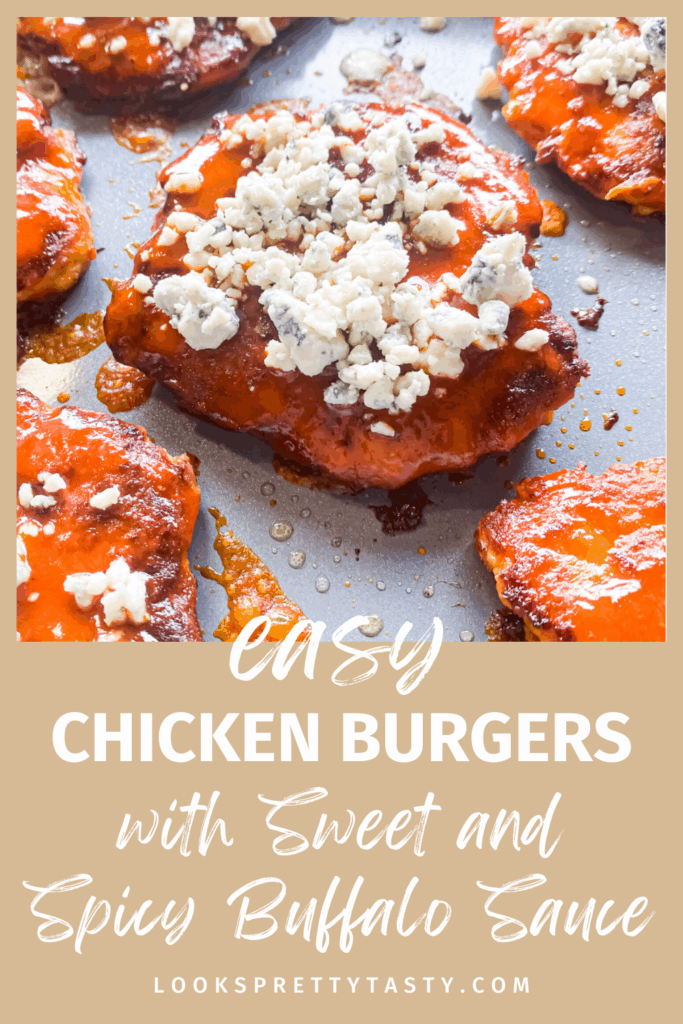 pinterest ready image of chicken burger with buffalo sauce and blue cheese crumbles