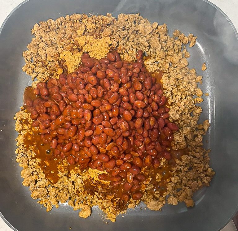 ground meat with chili beans on top 