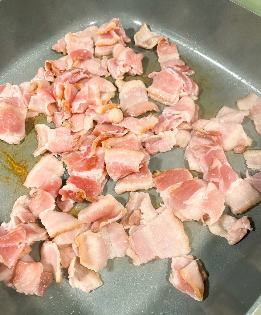 bacon cooking in a skillet