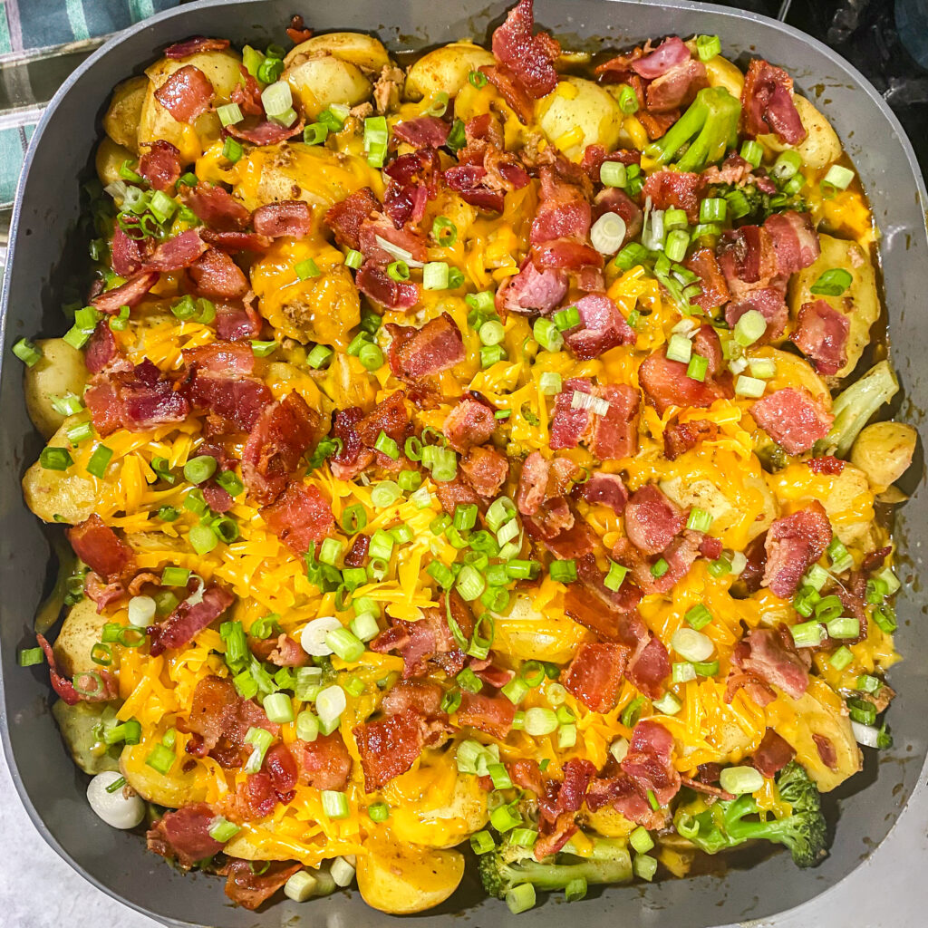 loaded baked potato skillet on a stove