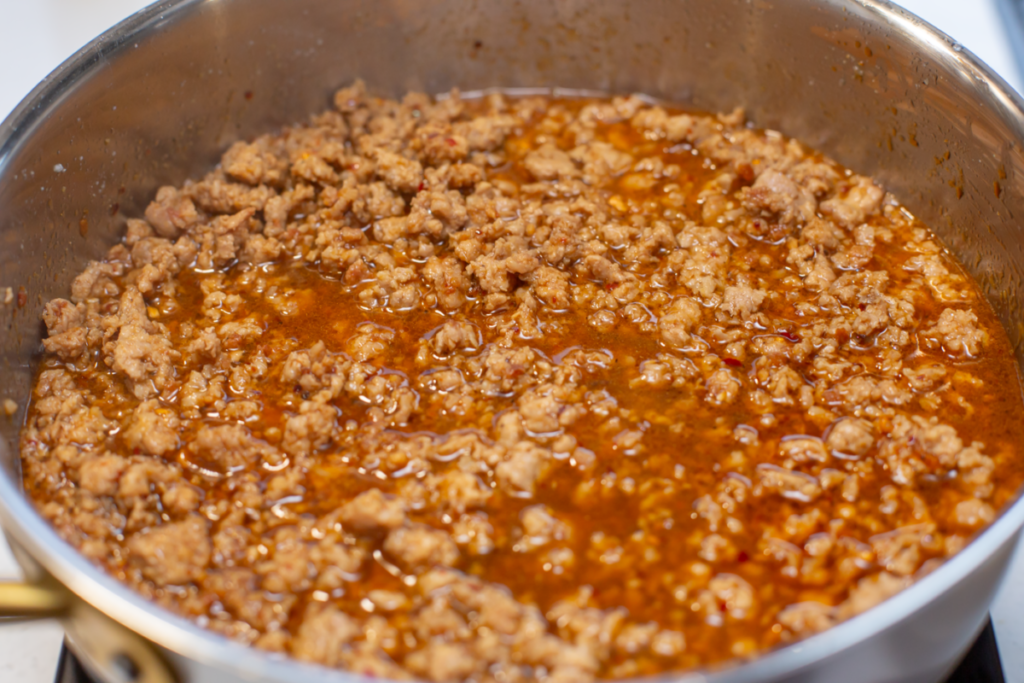 saucy ground pork in a pan