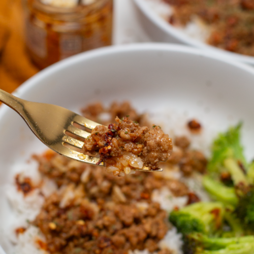 easy asian pork and rice on a fork