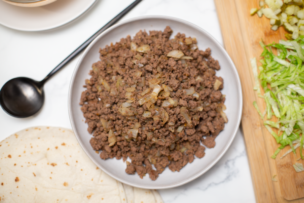 ground beef and onion mixture in a white bowl