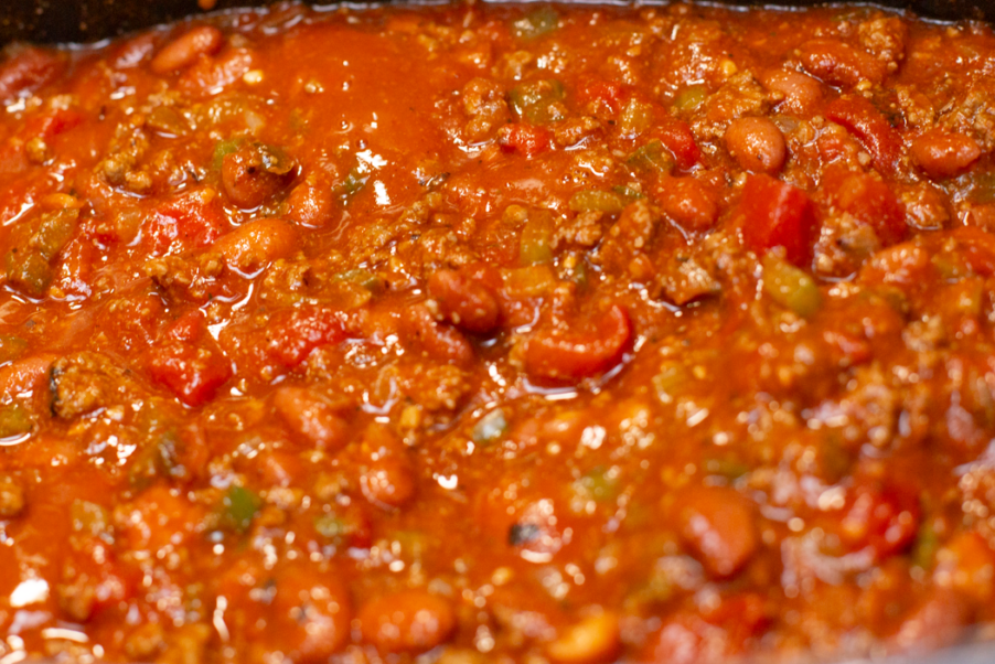 beef, veggies, tomato sauce, canned tomatoes and seasonings all mixed together in the pot