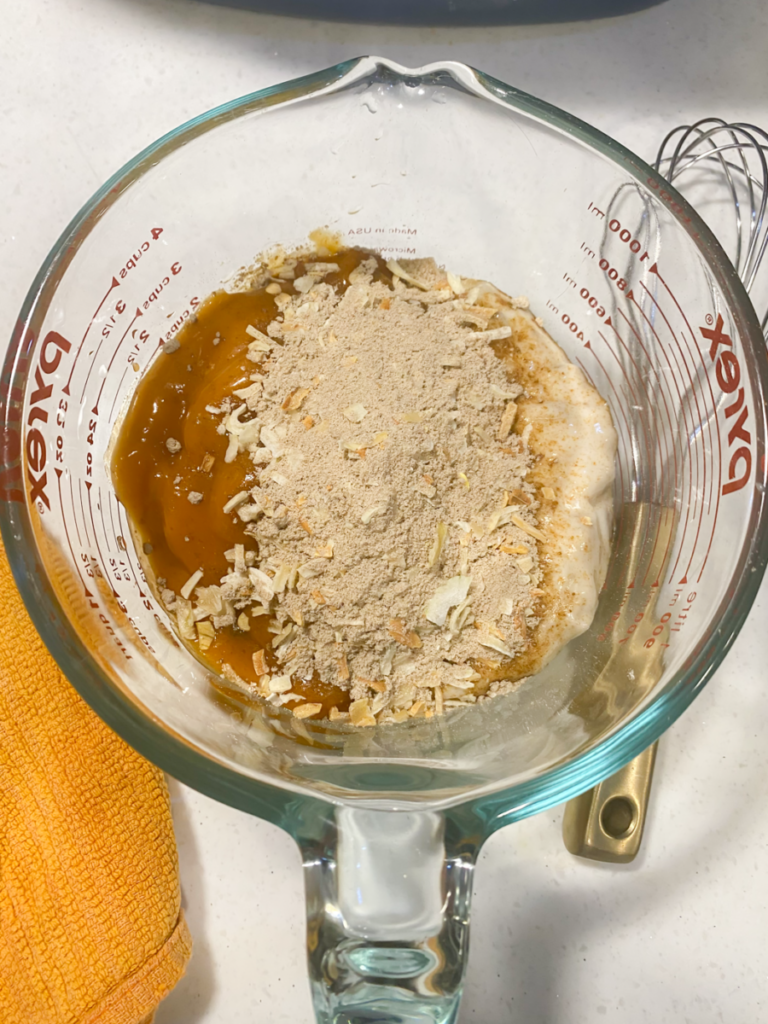 the sauce ingredients in a mixing bowl before they are mixed. 